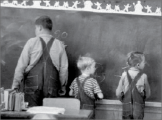 students at a chalk board