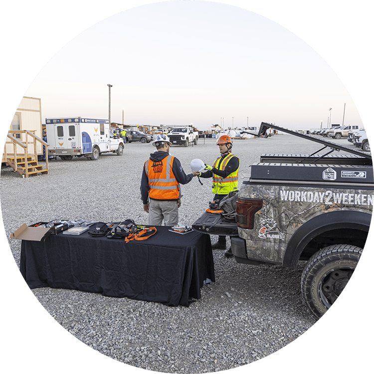 Two people talking safety at a jobsite