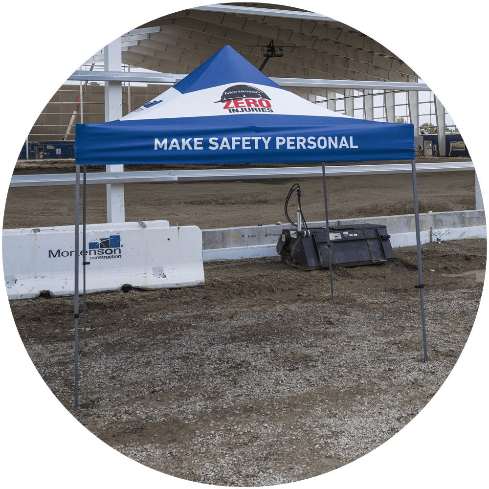 Two people talking safety at a jobsite
