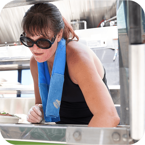 Taco Truck employee staying cool with a Chill-Its 6604 Cooling Towel