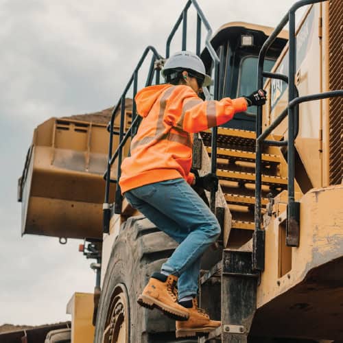 Woman climbing in well fitting GloWear Women's Fit Hi-Vis Sweatshirt