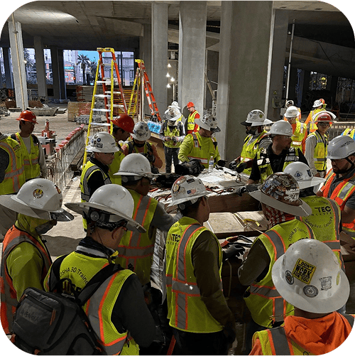 Workers learning about safety during a Stand-Down event