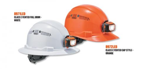 Orange and white hard hats with LED lighting
