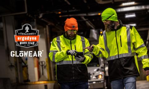 Two workers wearing hi-vis work jackets and hats