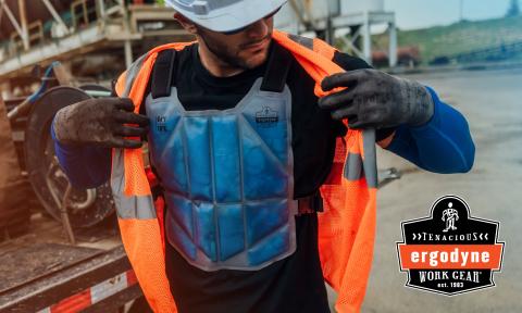 Worker wearing a cooling vest under a hi vis vest