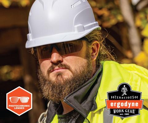 Worker wearing photochromic lens safety glasses
