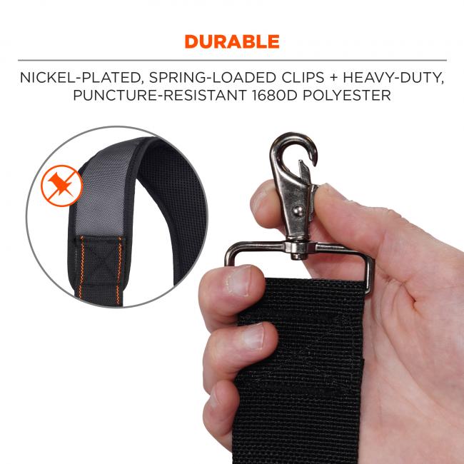 Durable: nickel-plated, spring-loaded clips + heavy-duty, puncture-resistant 1680D polyester. Image shows detail of clip and material. 