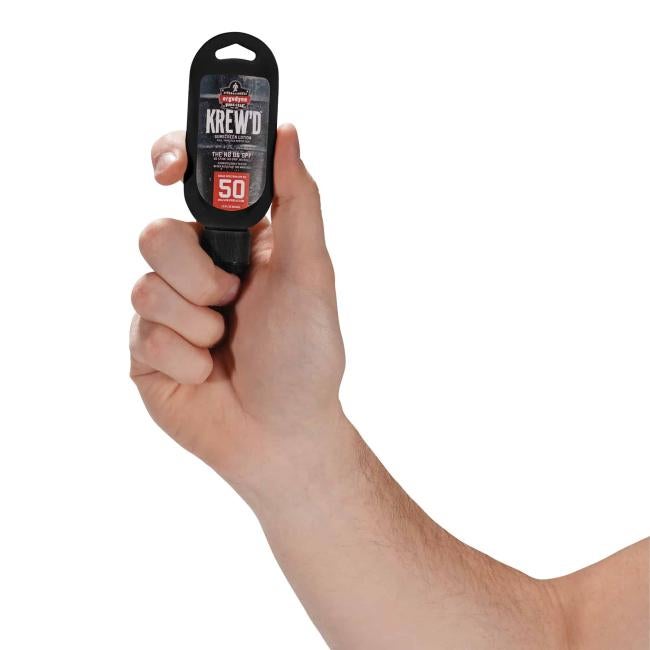 hand holding 1.5 oz bottle of sunscreen