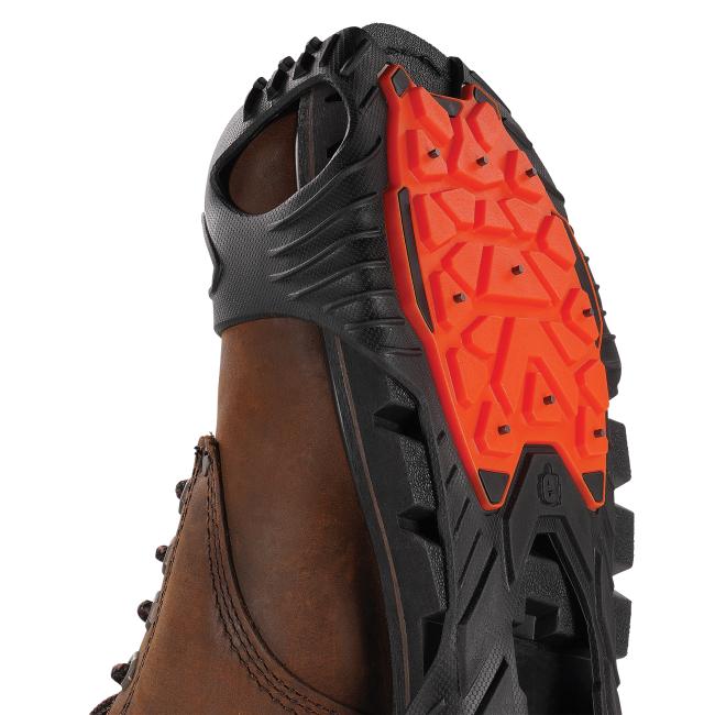 Tread view of ice traction cleats on a boot