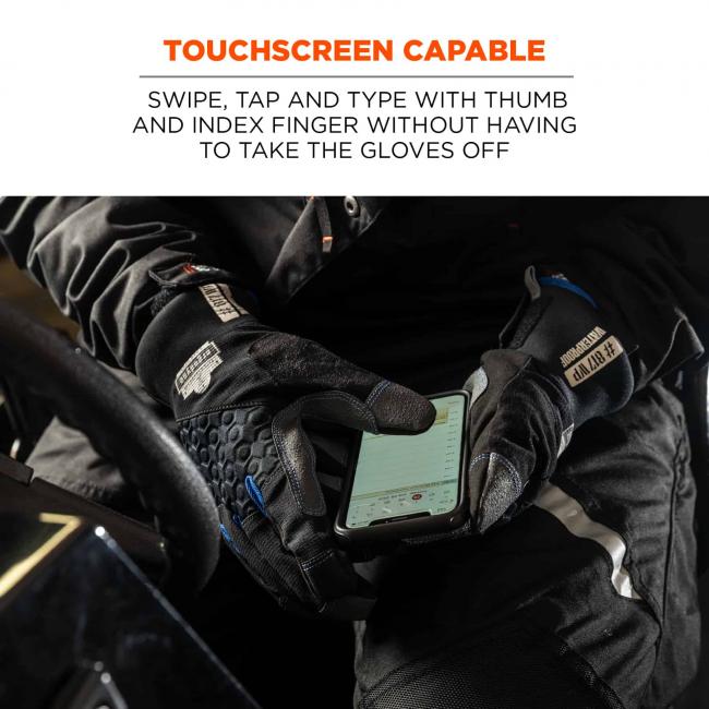 Touchscreen capable: swipe, tap, and type with thumb and index finger without having to take the gloves off. Image shows worker wearing gloves and using phone. 