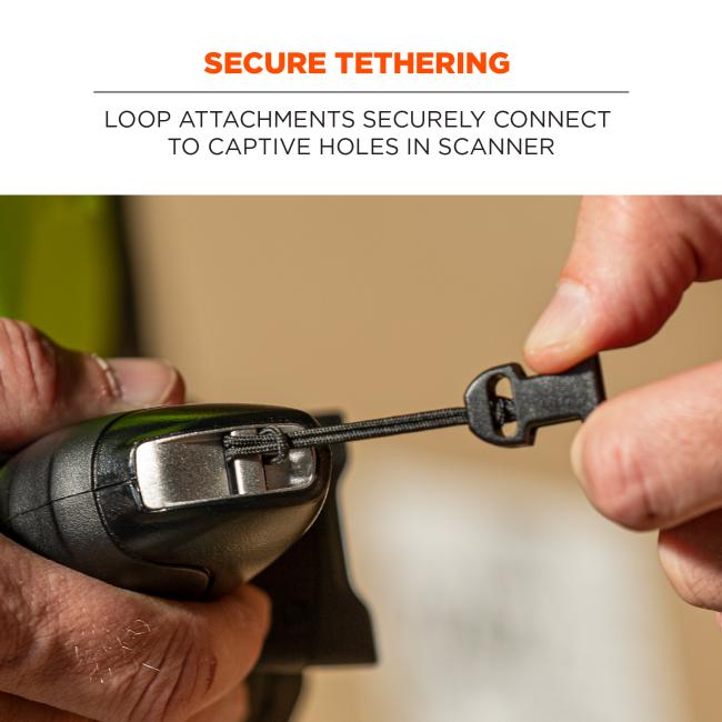 Secure tethering: loop attachments securely connect to captive holes in scanner. Image shows detail in loop attachment