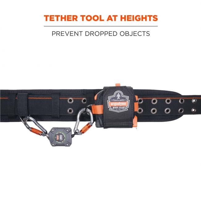 Tether tools at heights: prevent dropped objects. Image shows lanyard and tape measure attached to tool belt.