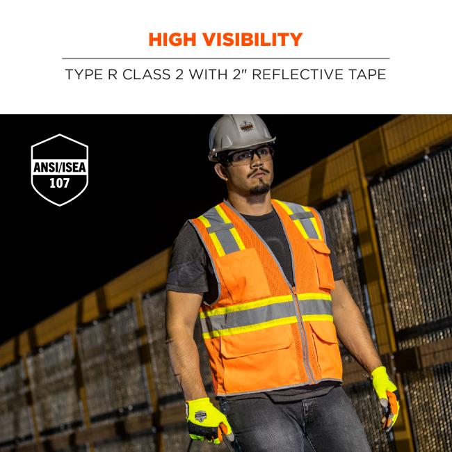 High visibility: type r class 2 with 2” reflective tape. Meets ANSI/ISEA 107 standard. Image shows construction worker wearing vest at night.