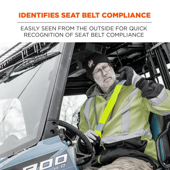 Identifies seat belt compliance: easy seen from the outside for quick recognition of seat belt compliance. Image shows driver adjusting seat belt. 