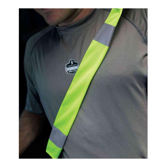 Person wearing seat belt cover
