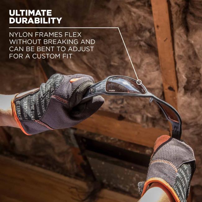 Ultimate durability: nylon frames flex without breaking and can be bent to adjust for a custom fit. Image shows someone stretching and flexing glasses. 