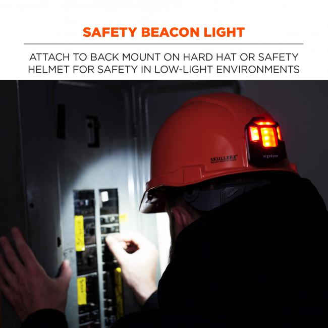 Safety beacon light: attach to back mount on hard hat or safety helmet for safety in low-light environments. Image shows light on back of person wearing hard hat. 