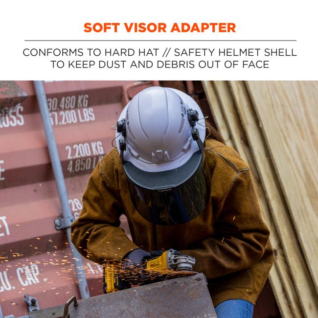 Soft visor adapter: conforms to hard hat // safety helmet shell to keep dust and debris out of face. 
