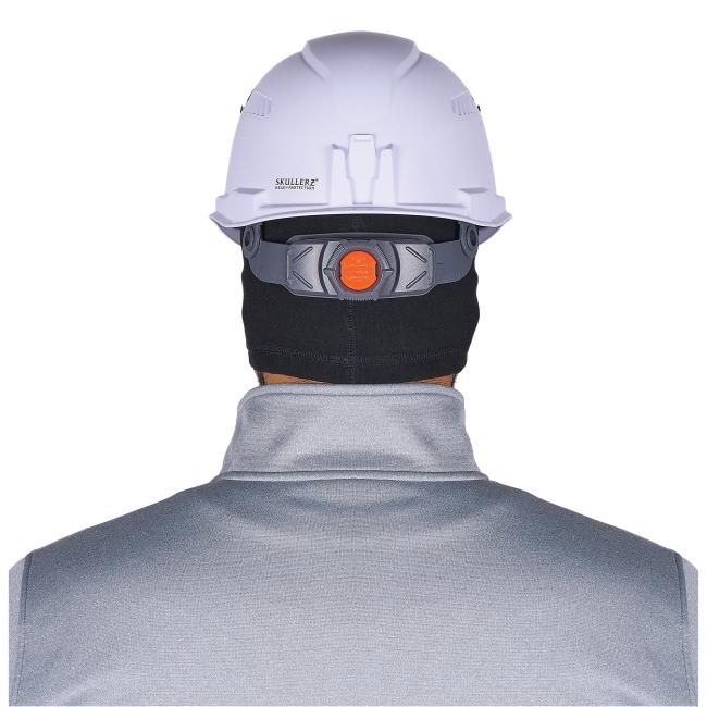 Rear view of person wearing a white safety helmet with gray adjustment strap and orange dial, black neck covering and gray jacket