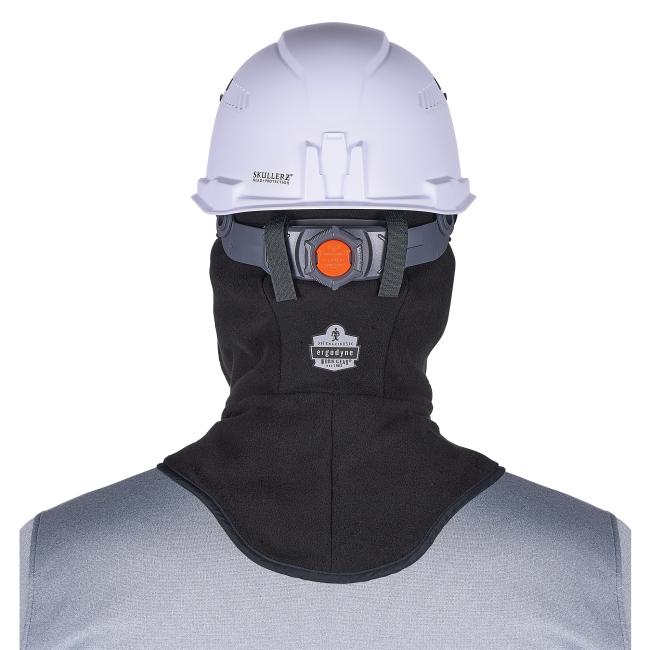Rear view of a white safety helmet with rear adjustment dial and straps worn on a black hooded mannequin covering a gray shirt