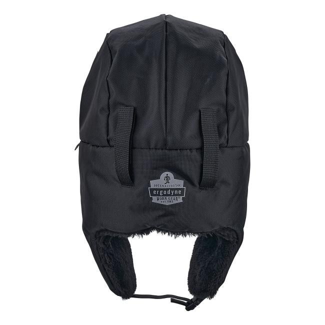 Black winter trapper hat with ear flaps, faux-fur lining, chin strap, two front straps and a visible rectangular logo patch on the front