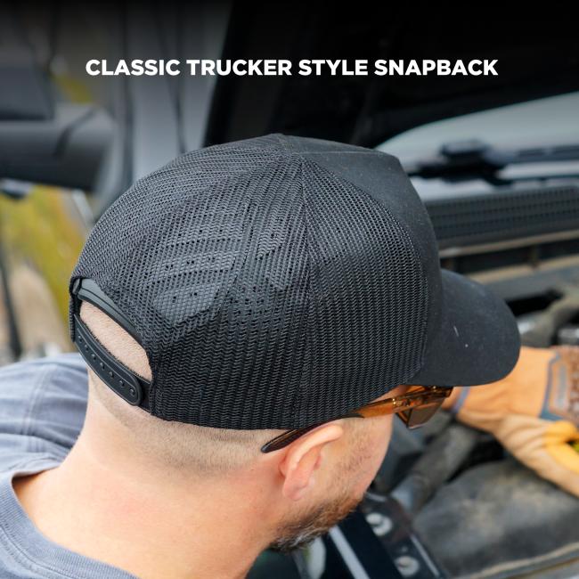 Rear of person's head wearing black mesh cap with adjustable snapback strap and sunglasses hooked at ear