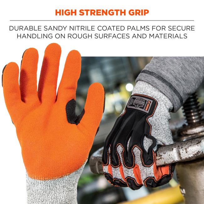 Close-up of two work gloves: orange sandy-coated glove palm and gray knit glove with black and orange reinforcements gripping a metal pipe.