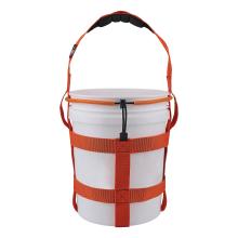 White plastic bucket fitted with orange webbing harness, horizontal straps and padded orange shoulder strap