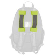 Pair of lime hi-vis strap covers on a faded backpack