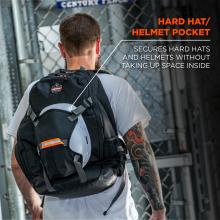 Hard hat/ helmet pocket. Secures hard hats and helmets without taking up space inside