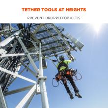 Tether tools at heights: prevent dropped objects. Image shows tower climber in the air with tethered tools. 