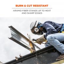 Burn & cut resistant: aramid fiber stands up to heat and sharp edges. Image shows worker using tethered tool. 
