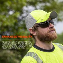 Enhanced visibility. Fluorescent lime fabric with reflective brim and logo boosts visibility to keep wearers safe.