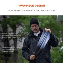 Two-piece design: for versatile warmth and protection. Man is stretching material and arrows say “moisture-wicking polyester absorbs sweat and dries fast” and “comfortable fleece for warmth in cold temperatures”