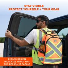 Worker in sunglasses wearing neon safety vest and orange reflective X-design backpack opening a vehicle door