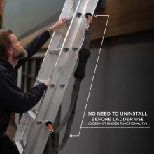 No need to uninstall before ladder use. The strap system does not hinder ladder functionality.