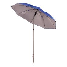 Umbrella stand spike attached to blue umbrella