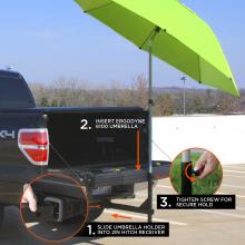Open black pickup tailgate with a bright green umbrella on a vertical pole inserted into a hitch holder; inset shows a hand tightening a screw.