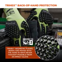 Close-up of high-visibility yellow work gloves with black triangular-tile impact pads on the back of the hand, resting on a workbench