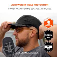 Man adjusting a black cap while wearing amber safety glasses; bump protection and certification shield icons shown