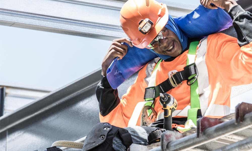 Worker using cooling towel