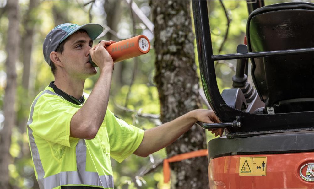 Worker drinking water