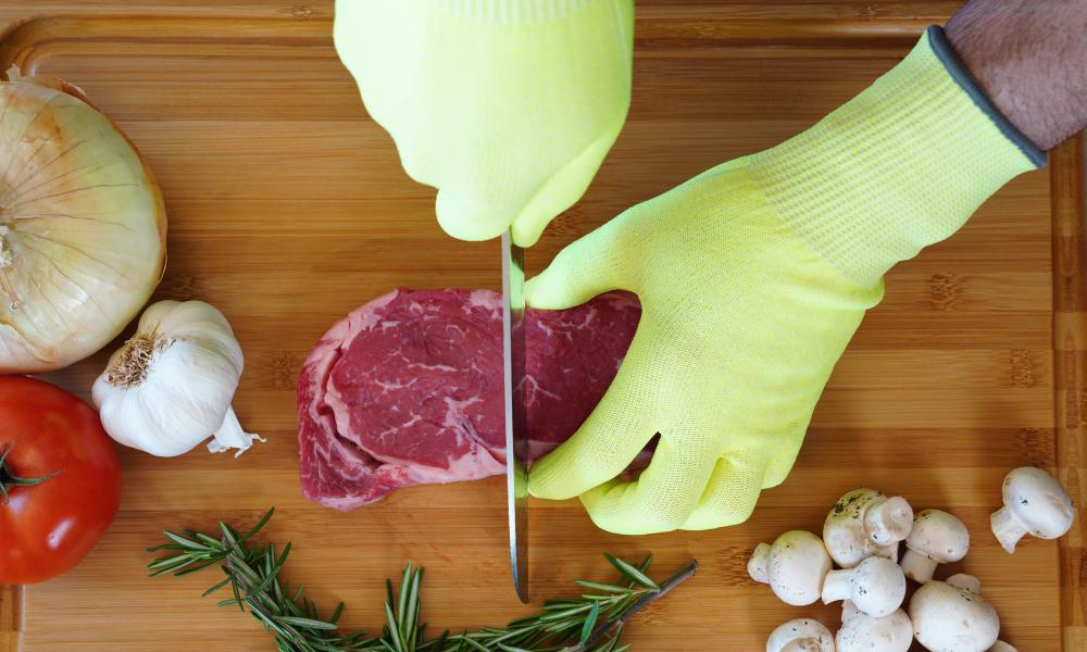 7040 gloves cutting into steak