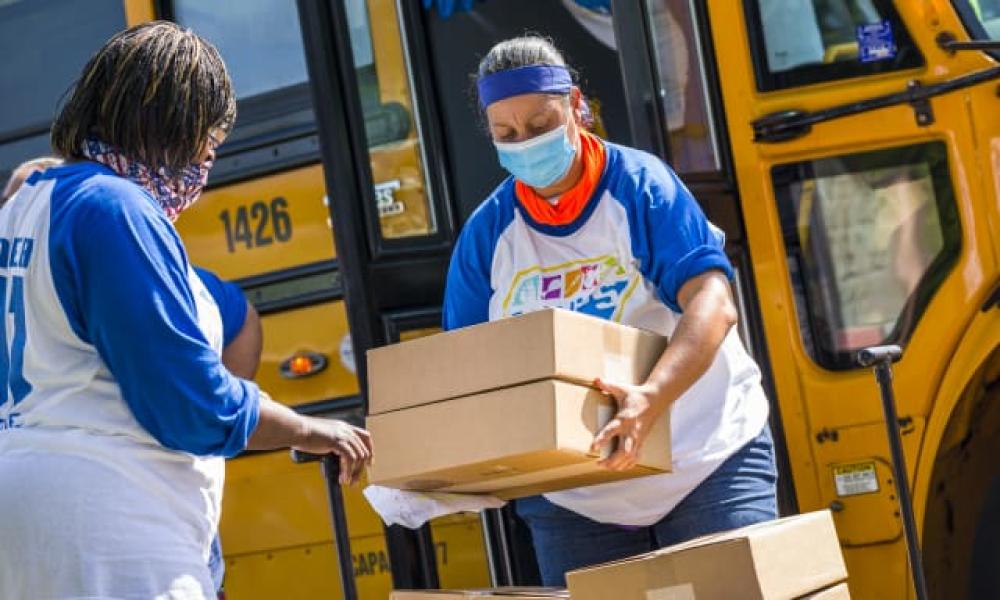 SPPS Food Delivery workers moving boxes