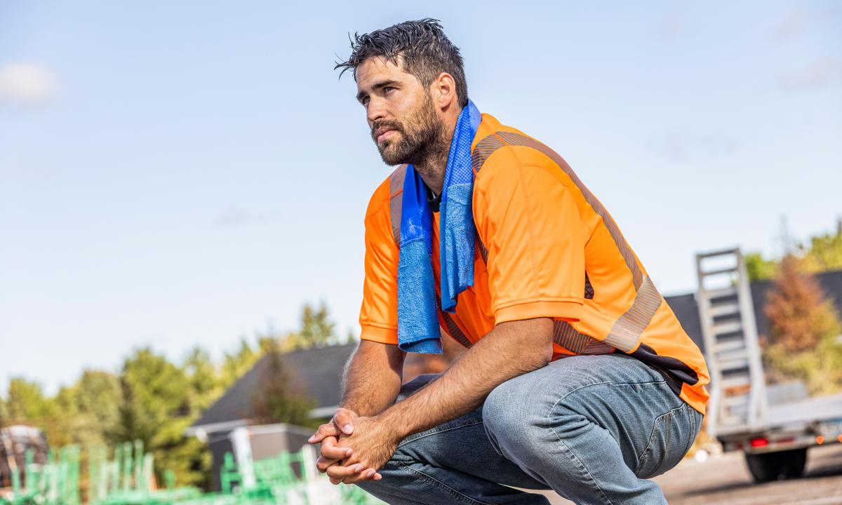 Worker wearing cooling towel