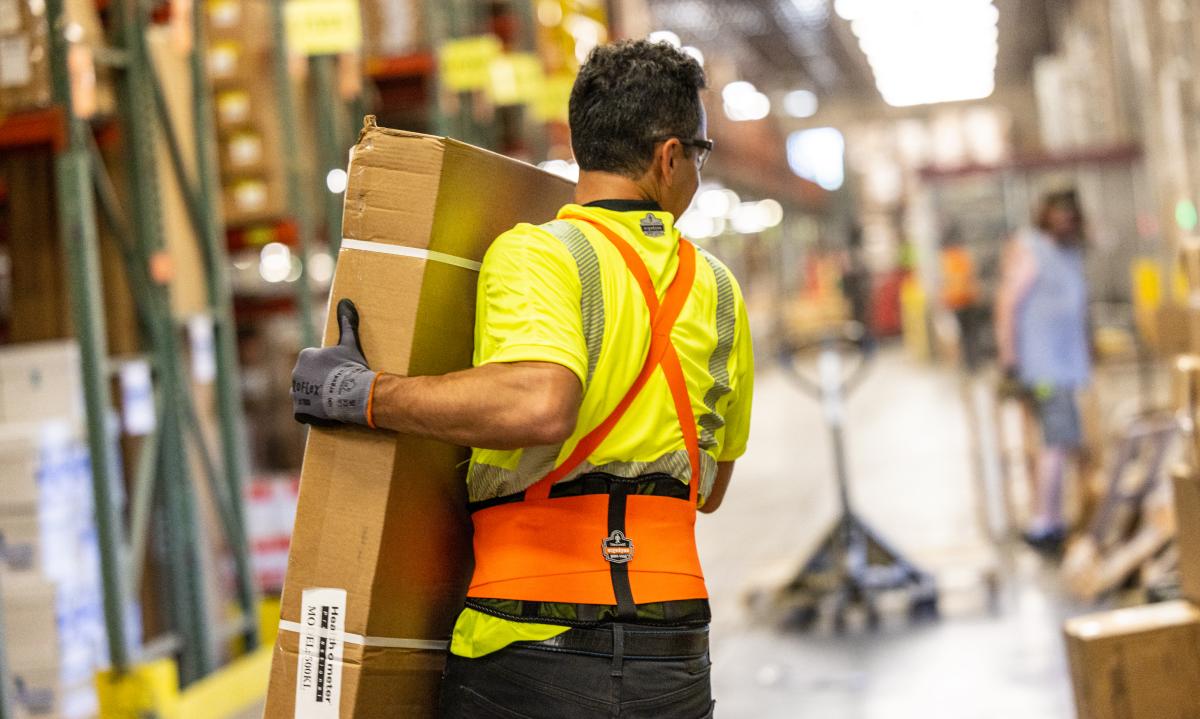 Man carrying heavy box