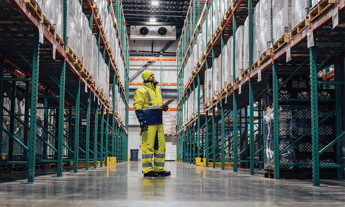 Worker in a cold storage warehouse