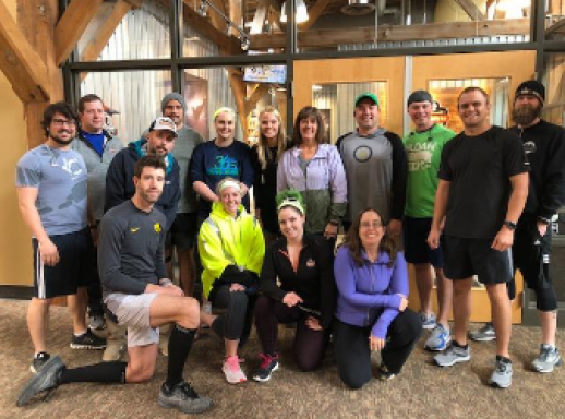 About Us | Our Commitment | Group of Ergodyne employees in exercise clothes