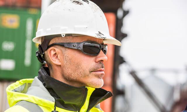 Worker wearing safety glasses
