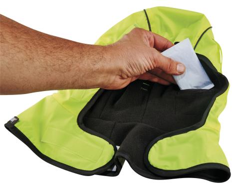placing hand warmer pack in a thermal liner